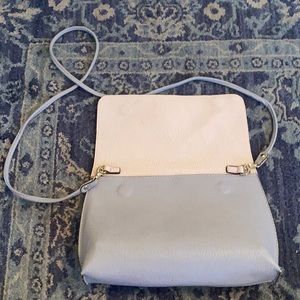 Gray purse with pink inside lining